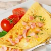 Омлет с ветчиной и помидорами | Ресторан «ВолкоВкус»
